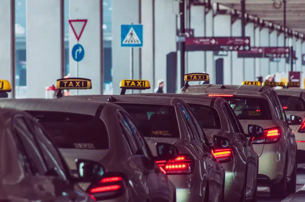 Why Supreme Taxis Is Now a Reliable Option for Airport Transfers and Thame Taxis 1 Queue of taxis waiting at an airport terminal